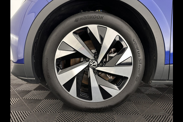 Volkswagen ID.4 First 77 kWh [ 3-Fase ] {SOH-83%} (INCL-BTW) *LEATHER-MICROFIBRE | FULL-LED | ADAPTIVE-CRUISE | HEATED-COMFORTSEATS | DIGI-COCKPIT | AMBIENTLIGHT | NAVI-FULLMAP | PDC | TOWBAR | PRIVACY-GLASS | CAMERA | 20''ALU*