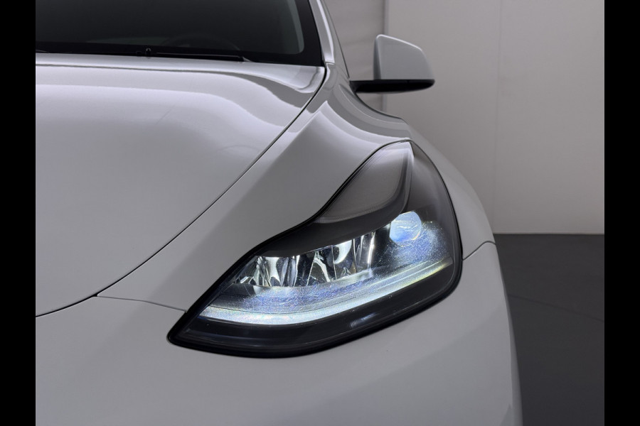 Tesla Model Y RWD Warmtepomp LFP-Accu Leer Lmv Camera's Pano-dak Adap.Cruise Navi Ecc Autopilot Stoel+Stuur+Achterbank Verwarming Elek.Achterklep Dodehoek detector Draadloze telefoonlader SOH 93% 1e Eigenaar Origineel Nederlandse Auto 1.600KG Trekgewicht