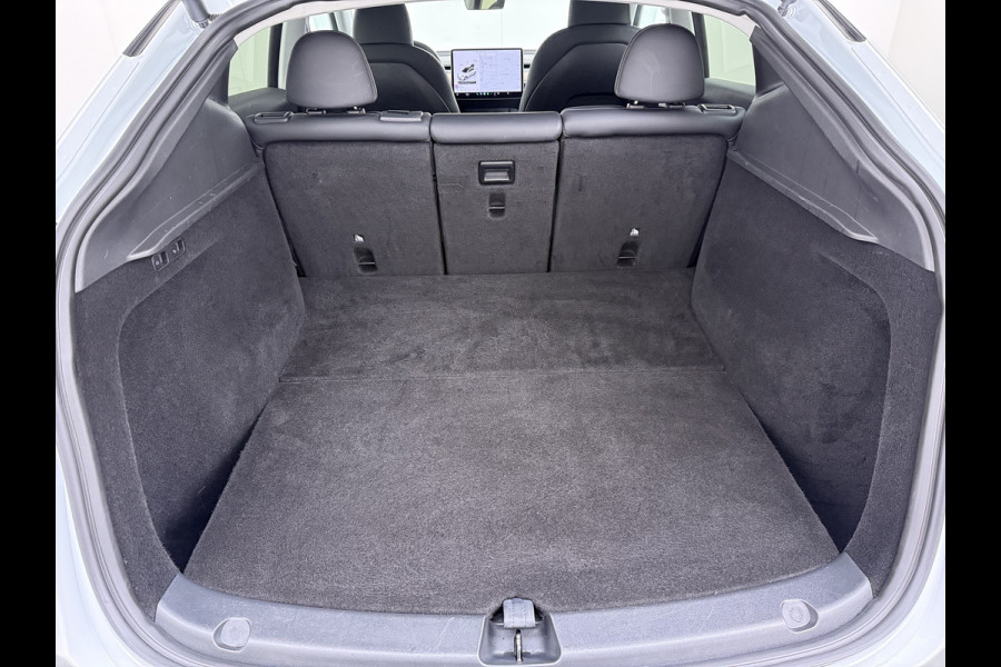 Tesla Model Y RWD Warmtepomp LFP-Accu Leer Lmv Camera's Pano-dak Adap.Cruise Navi Ecc Autopilot Stoel+Stuur+Achterbank Verwarming Elek.Achterklep Dodehoek detector Draadloze telefoonlader SOH 93% 1e Eigenaar Origineel Nederlandse Auto 1.600KG Trekgewicht