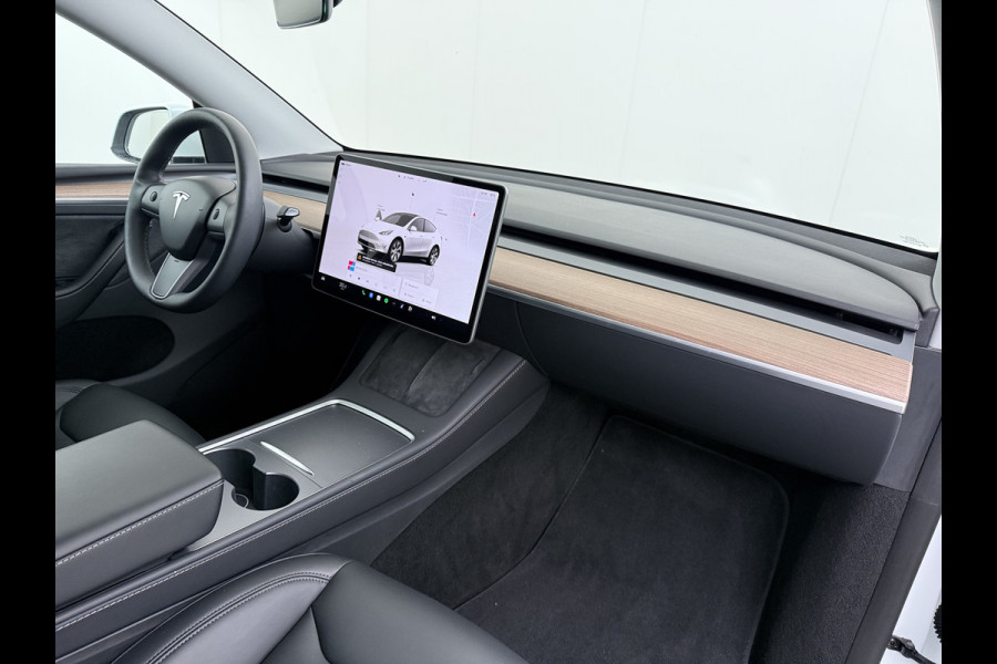 Tesla Model Y RWD Warmtepomp LFP-Accu Leer Lmv Camera's Pano-dak Adap.Cruise Navi Ecc Autopilot Stoel+Stuur+Achterbank Verwarming Elek.Achterklep Dodehoek detector Draadloze telefoonlader SOH 93% 1e Eigenaar Origineel Nederlandse Auto 1.600KG Trekgewicht