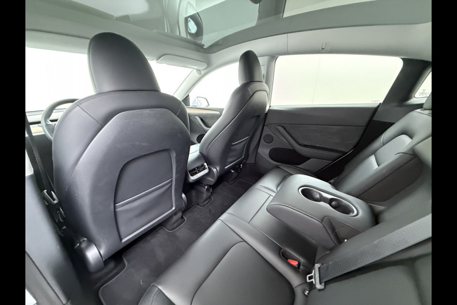 Tesla Model Y RWD Warmtepomp LFP-Accu Leer Lmv Camera's Pano-dak Adap.Cruise Navi Ecc Autopilot Stoel+Stuur+Achterbank Verwarming Elek.Achterklep Dodehoek detector Draadloze telefoonlader SOH 93% 1e Eigenaar Origineel Nederlandse Auto 1.600KG Trekgewicht
