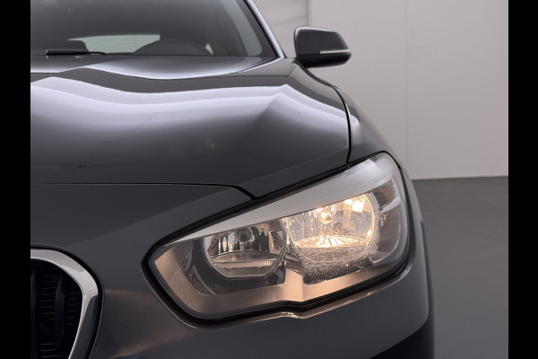 BMW 1-serie 118i AUT-8 Sport Navi Ecc Trekhaak Pdc Sportstoelen Corporate Edition Lmv 17" Regen-Lichtsensor Isofix Bluetooth Origineel Nederlandse Auto Zeer nette BMW 118I