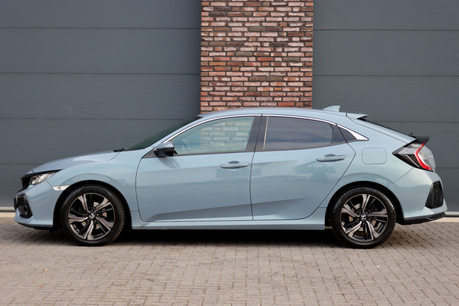 Honda Civic 1.0 i-VTEC Elegance | Adaptive Cruise Control | Stoelverwarming | Camera | Apple Carplay/Android Auto | Climate Control | DAB | Mistlampen |