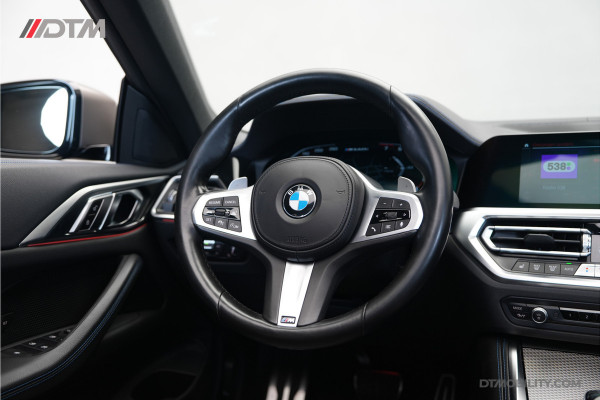 BMW 4 Serie Cabrio M440i xDrive High Executive | Adaptive Cruise Control | Ambient | Sanremo Grün