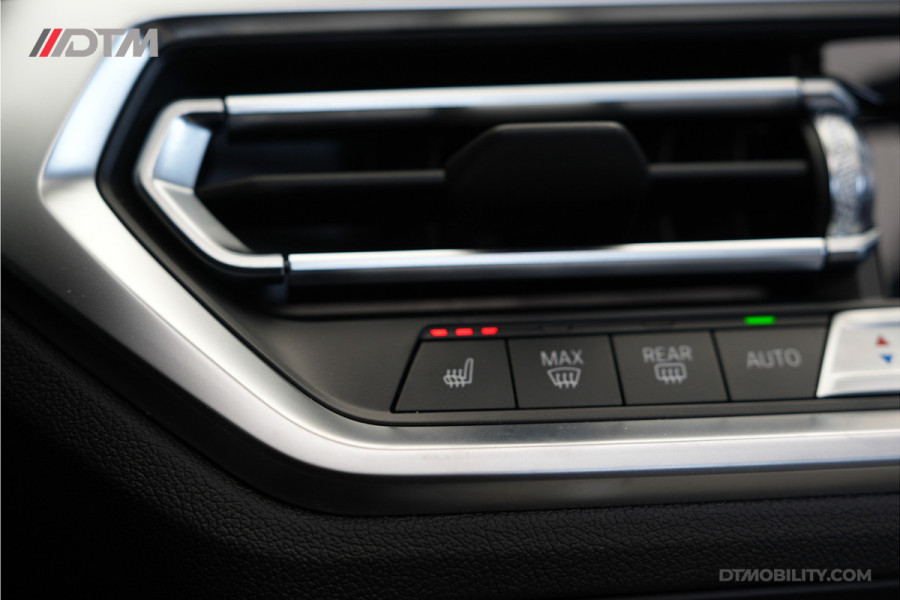 BMW 4 Serie Cabrio M440i xDrive High Executive | Adaptive Cruise Control | Ambient | Sanremo Grün