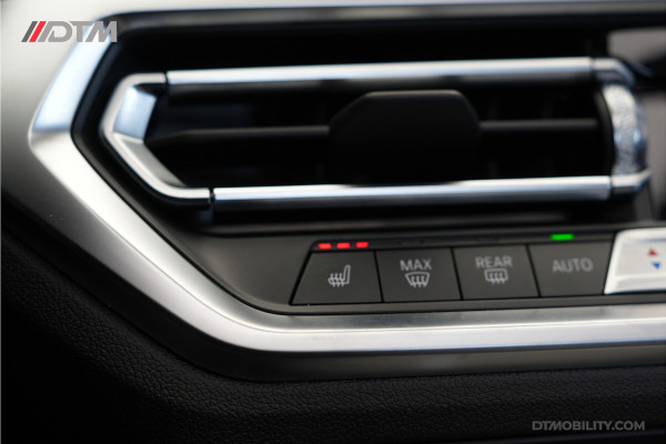 BMW 4 Serie Cabrio M440i xDrive High Executive | Adaptive Cruise Control | Ambient | Sanremo Grün