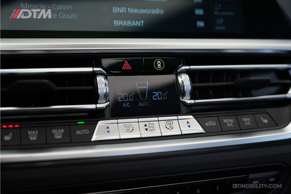 BMW 4 Serie Cabrio M440i xDrive High Executive | Adaptive Cruise Control | Ambient | Sanremo Grün