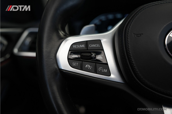 BMW 4 Serie Cabrio M440i xDrive High Executive | Adaptive Cruise Control | Ambient | Sanremo Grün