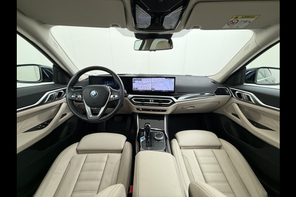 BMW i4 eDrive40 340pk High Executive 84kWh SOH 99% Pano-Dak/Hefdak SportSt+Leer+(Stuur+)Verwarmd 360°Camera Adaptive-Cruise+s&go Park-A Semi-Autopilot Drive-Assist-pro Active-Guard-Plus Elektr.Achterklep Draadl-Lader BAS ESP BMW Individual interieurlijsten Pianolak schwarz BMW Individual Exterieur Line Aluminium satiniert BMW Copilot-pack Dodehoekdetectie/correctie, Kruisend-verkeer-Detectie, rijstrooksensor met correctie, rondomzicht camera, uitwijk assistent) 0-100 5,6 sec. 1600kg trekvermogen! € 73.000 nieuw