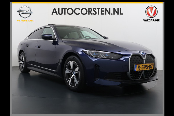 BMW i4 eDrive40 340pk High Executive 84kWh SOH 99% Pano-Dak/Hefdak SportSt+Leer+(Stuur+)Verwarmd 360°Camera Adaptive-Cruise+s&go Park-A Semi-Autopilot Drive-Assist-pro Active-Guard-Plus Elektr.Achterklep Draadl-Lader BAS ESP BMW Individual interieurlijsten Pianolak schwarz BMW Individual Exterieur Line Aluminium satiniert BMW Copilot-pack Dodehoekdetectie/correctie, Kruisend-verkeer-Detectie, rijstrooksensor met correctie, rondomzicht camera, uitwijk assistent) 0-100 5,6 sec. 1600kg trekvermogen! € 73.000 nieuw