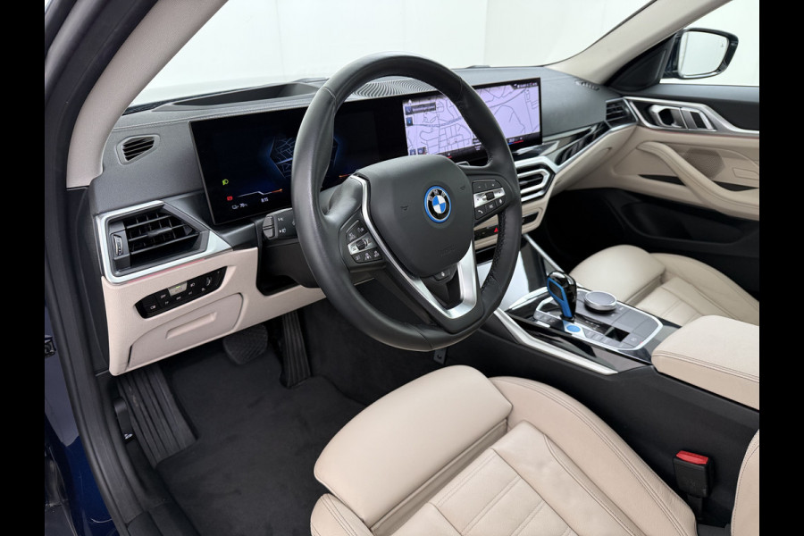 BMW i4 eDrive40 340pk High Executive 84kWh SOH 99% Pano-Dak/Hefdak SportSt+Leer+(Stuur+)Verwarmd 360°Camera Adaptive-Cruise+s&go Park-A Semi-Autopilot Drive-Assist-pro Active-Guard-Plus Elektr.Achterklep Draadl-Lader BAS ESP BMW Individual interieurlijsten Pianolak schwarz BMW Individual Exterieur Line Aluminium satiniert BMW Copilot-pack Dodehoekdetectie/correctie, Kruisend-verkeer-Detectie, rijstrooksensor met correctie, rondomzicht camera, uitwijk assistent) 0-100 5,6 sec. 1600kg trekvermogen! € 73.000 nieuw