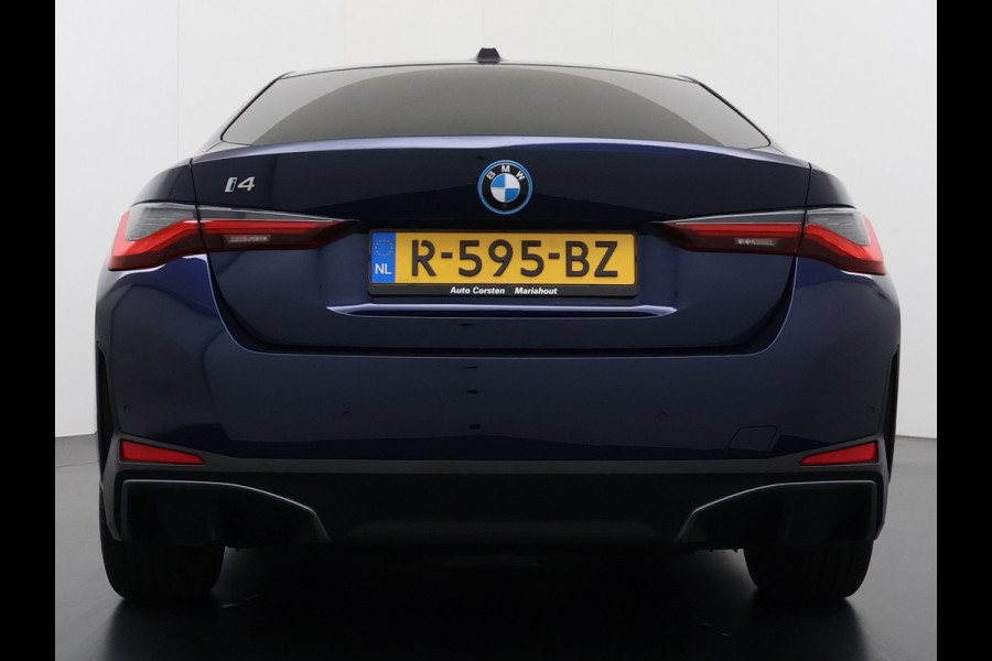 BMW i4 eDrive40 340pk High Executive 84kWh SOH 99% Pano-Dak/Hefdak SportSt+Leer+(Stuur+)Verwarmd 360°Camera Adaptive-Cruise+s&go Park-A Semi-Autopilot Drive-Assist-pro Active-Guard-Plus Elektr.Achterklep Draadl-Lader BAS ESP BMW Individual interieurlijsten Pianolak schwarz BMW Individual Exterieur Line Aluminium satiniert BMW Copilot-pack Dodehoekdetectie/correctie, Kruisend-verkeer-Detectie, rijstrooksensor met correctie, rondomzicht camera, uitwijk assistent) 0-100 5,6 sec. 1600kg trekvermogen! € 73.000 nieuw