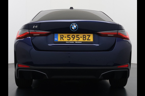 BMW i4 eDrive40 340pk High Executive 84kWh SOH 99% Pano-Dak/Hefdak SportSt+Leer+(Stuur+)Verwarmd 360°Camera Adaptive-Cruise+s&go Park-A Semi-Autopilot Drive-Assist-pro Active-Guard-Plus Elektr.Achterklep Draadl-Lader BAS ESP BMW Individual interieurlijsten Pianolak schwarz BMW Individual Exterieur Line Aluminium satiniert BMW Copilot-pack Dodehoekdetectie/correctie, Kruisend-verkeer-Detectie, rijstrooksensor met correctie, rondomzicht camera, uitwijk assistent) 0-100 5,6 sec. 1600kg trekvermogen! € 73.000 nieuw