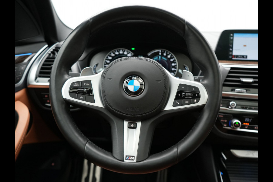 BMW X3 xDrive30e M Sport Plug In Hybrid 293pk Dealer O.H. PHEV | Panodak | Sfeerverlichting | Lederen Sportstoelen Memory & Verwarmd | Stuur Verwarmd | Apple Carplay | Keyless | Cruise Control | Navigatie | DAB | 19"L.M |