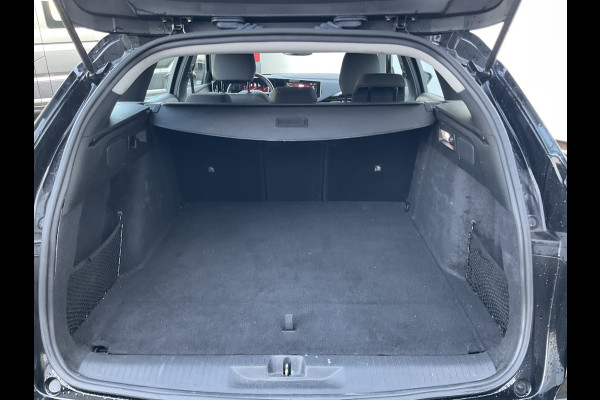 Opel Astra Sports Tourer 1.6 Turbo 260pk Hybrid PHEV Carplay Sensoren voor/achter Dab Adaptieve cruise