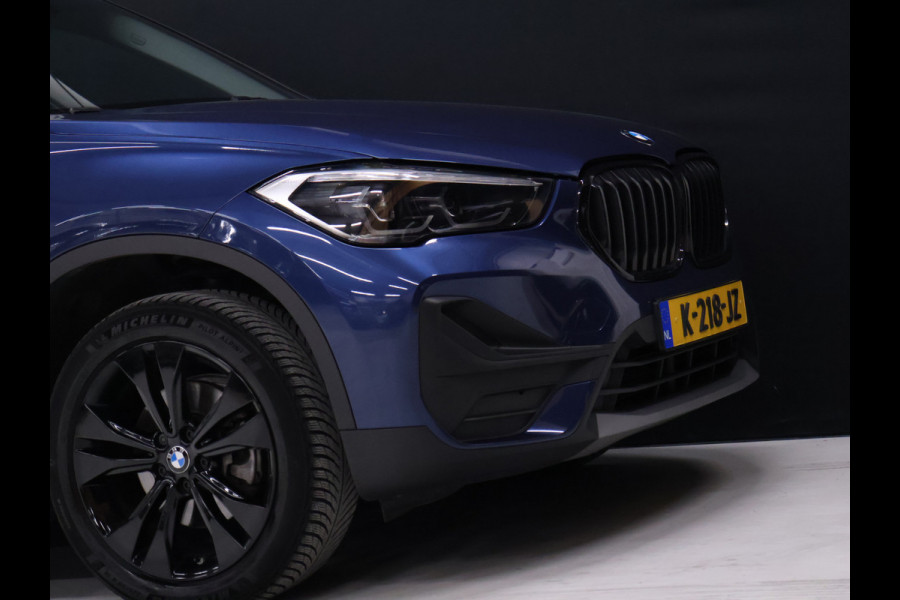 BMW X1 sDrive18i Sport *WEEKAANBIEDING* [HEAD-UP DISPLAY, GROOT NAVIGATIE, VOL LEDER, PDC ACHTER, STOELVERWARMING, AUTOMATISCHE AIRCO, ELEKTRISCHE ACHTERKLEP, BMW LED, CRUISE CONTROL, BLUETOOTH TELEFOON, NIEUWSTAAT
