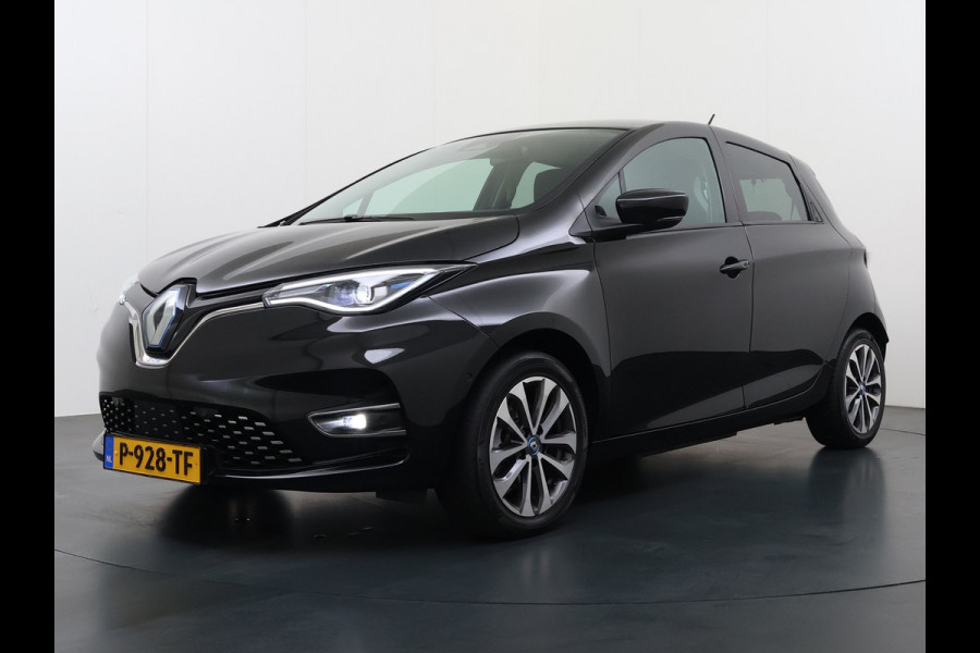 Renault ZOE R135 Intens 52 kWh SOH 92% Fase 3 Warmtepomp Apple Carplay Android Auto Navi Ecc Cruise Control Camera Pdc Lane Assist Stoel+Stuurverwarming Regen-Lichtsensor Parkeerhulp Dodehoek Lmv Privacy Glas Facelift model Eigen Accu Zeer compleet