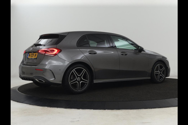 Mercedes-Benz A-Klasse 180 AMG | Stoelverwarming | Leder/Alcantara | Sfeerverlichting | Widescreen | Full LED | Park Assist | Navigatie | Sportstoelen | Climate control | Cruise control