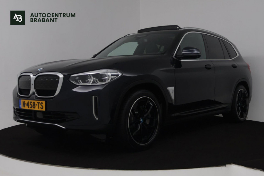 BMW iX3 High Executive 80 kWh (PANORAMADAK, SoH 97.7, SFEERVERLICHTING, STOELVERWARMING, ACHTERUITRIJCAMERA, NAVIGATIE)