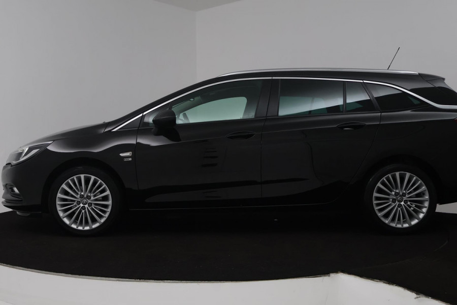 Opel Astra Sports Tourer 1.4 Turbo 120 Jaar Edition (TREKHAAK, PARKEERSENSOREN, CRUISE CONTROL, NAVIGATIE)