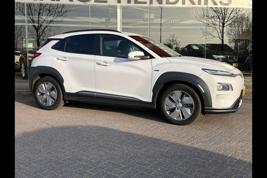Hyundai Kona EV Fashion 64 kWh | SOH: 95,1% | 3 Fase | warmtepomp | HUD | Blindspot | Climate | Navi |