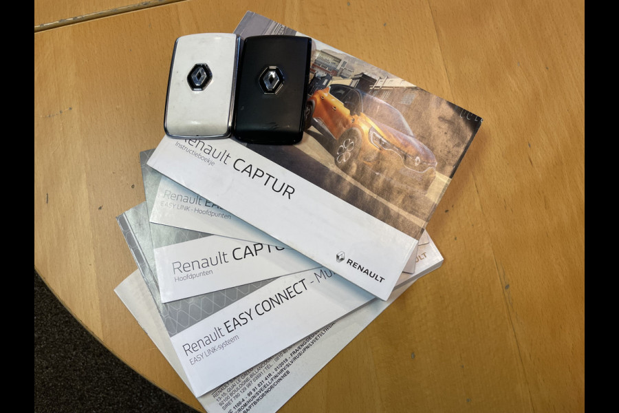 Renault Captur 1.0 TCe 100 Bi-Fuel Business Zen Airco - Cruise control - Parkeersensoren achter - Navigatiesysteem - Bluetooth - Stuur multifunctioneel - Stuur leder - Elektrische ramen - Licht metalen velgen 17 inch - Rijstrooksensor met