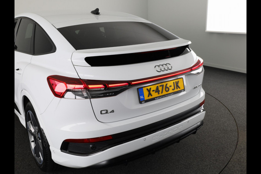 Audi Q4 Sportback e-tron 40 S edition 77 kWh 204 pk | SoH 98% | Navigatie | Parkeersensoren (Park assist) | Achteruitrijcamera | Stoelverwarming | S-Line |