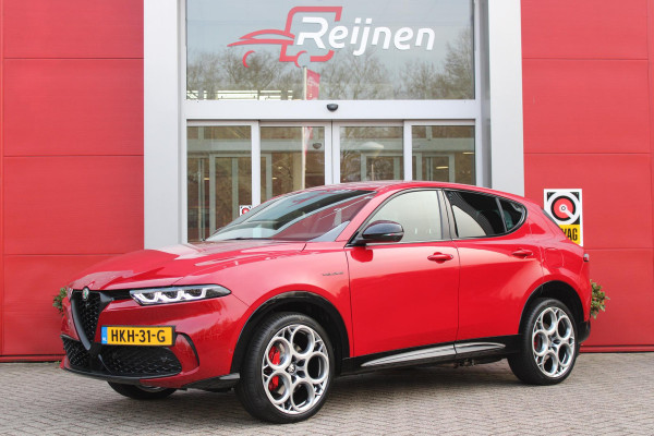 Alfa Romeo Tonale PHEV 280PK VELOCE | HARMAN/KARDON PREMIUM AUDIO | PREMIUM PACK: LEDEREN BEKLEDING/GEVENTILEERDE VOORSTOELEN/4-VOUDIG ELEKTRISCH VERSTELBARE LENDESTEUN VOORSTOELEN | WINTERPACK: STOEL/STUUR VERWARMING | STOEL VENTILATIE | TECHNOLOGY PACK: PARKEERWAARSCHUWING VOOR EN ACHTER/360° CAMERA/AUTOMATISCH INPARKEREN/ AUTONOMOUS DRIVING LEVEL 2: ADAPTIVE CRUISE CONTROL/LANE CENTERING ASSIST/TRAFFIC JAM ASSIST DODEHOEK DETECTIE AUTOMATISCH DIMMENDE BUITENSPIEGELS | DRAADLOZE TELEFOONLADER | FULL LED MATRIX KOPLAMPEN | DUAL STAGE VALVE: ACTIEVE DEMPING | KEYLESS ENTRY/START | 20" L