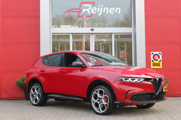 Alfa Romeo Tonale PHEV 280PK VELOCE | HARMAN/KARDON PREMIUM AUDIO | PREMIUM PACK: LEDEREN BEKLEDING/GEVENTILEERDE VOORSTOELEN/4-VOUDIG ELEKTRISCH VERSTELBARE LENDESTEUN VOORSTOELEN | WINTERPACK: STOEL/STUUR VERWARMING | STOEL VENTILATIE | TECHNOLOGY PACK: PARKEERWAARSCHUWING VOOR EN ACHTER/360° CAMERA/AUTOMATISCH INPARKEREN/ AUTONOMOUS DRIVING LEVEL 2: ADAPTIVE CRUISE CONTROL/LANE CENTERING ASSIST/TRAFFIC JAM ASSIST DODEHOEK DETECTIE AUTOMATISCH DIMMENDE BUITENSPIEGELS | DRAADLOZE TELEFOONLADER | FULL LED MATRIX KOPLAMPEN | DUAL STAGE VALVE: ACTIEVE DEMPING | KEYLESS ENTRY/START | 20" L