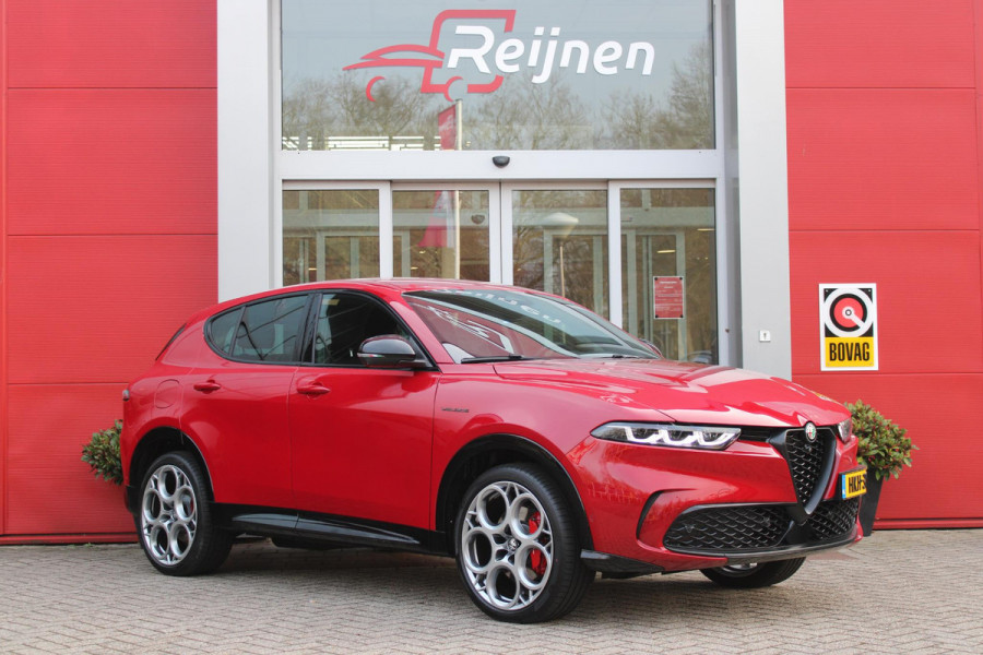 Alfa Romeo Tonale PHEV 280PK VELOCE | HARMAN/KARDON PREMIUM AUDIO | PREMIUM PACK: LEDEREN BEKLEDING/GEVENTILEERDE VOORSTOELEN/4-VOUDIG ELEKTRISCH VERSTELBARE LENDESTEUN VOORSTOELEN | WINTERPACK: STOEL/STUUR VERWARMING | STOEL VENTILATIE | TECHNOLOGY PACK: PARKEERWAARSCHUWING VOOR EN ACHTER/360° CAMERA/AUTOMATISCH INPARKEREN/ AUTONOMOUS DRIVING LEVEL 2: ADAPTIVE CRUISE CONTROL/LANE CENTERING ASSIST/TRAFFIC JAM ASSIST DODEHOEK DETECTIE AUTOMATISCH DIMMENDE BUITENSPIEGELS | DRAADLOZE TELEFOONLADER | FULL LED MATRIX KOPLAMPEN | DUAL STAGE VALVE: ACTIEVE DEMPING | KEYLESS ENTRY/START | 20" L