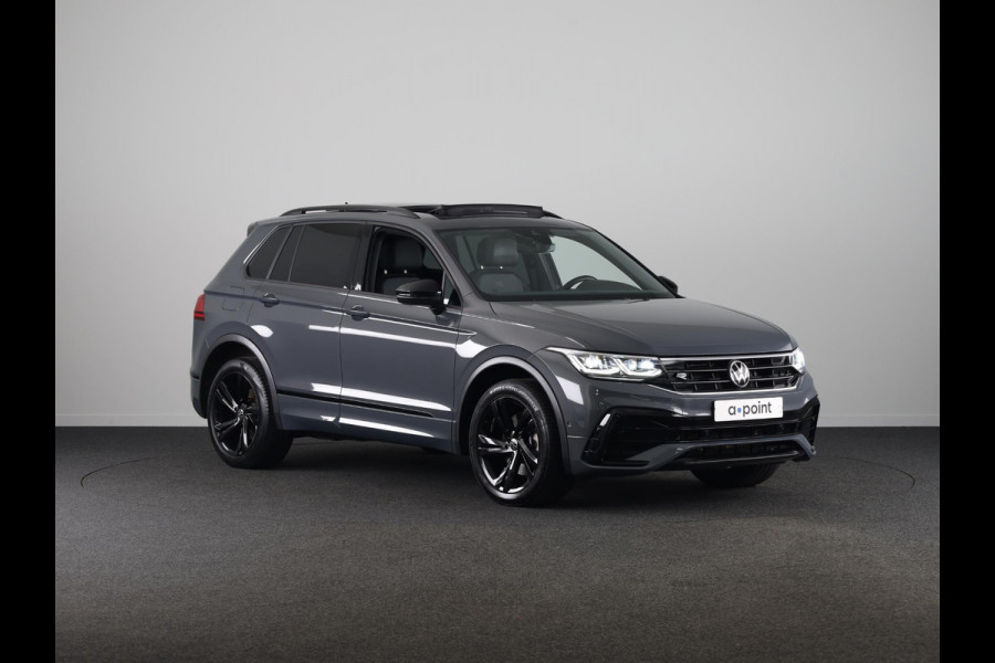 Volkswagen Tiguan 1.4 TSI eHybrid R-Line Business+ 245 pk Automaat (DSG) | Verlengde garantie | Navigatie | Panoramadak | Trekhaak (afneembaar) | Parkeersensoren (Park assist) | Achteruitrijcamera | Stoelverwarming |