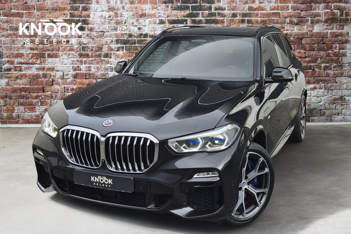 BMW X5 xDrive45e High Executive M Sport / Panoramadak / Achterasbesturing / Head Up Display / Comfortstoel / Driving Assistant Professional / Stuurwielverwarming / Trekhaak / Comforttoegang