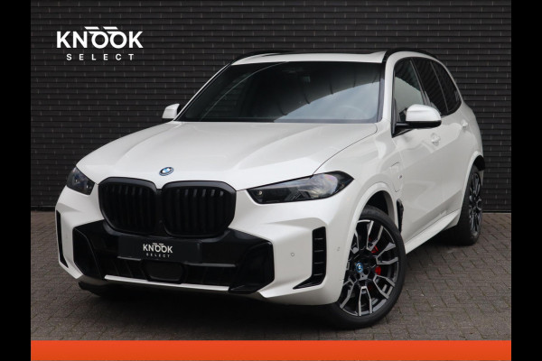 BMW X5 xDrive50e High Executive M Sport Pakket Automaat / Driving Assistant Professional / Stoelventilatie / Panoramadak / Trekhaak / Luchtvering / Iconic Glow / Gesture Control / Harman Kardon / Innovation Pakket / Craftedclarity / Stoelverwarmin voor+achter