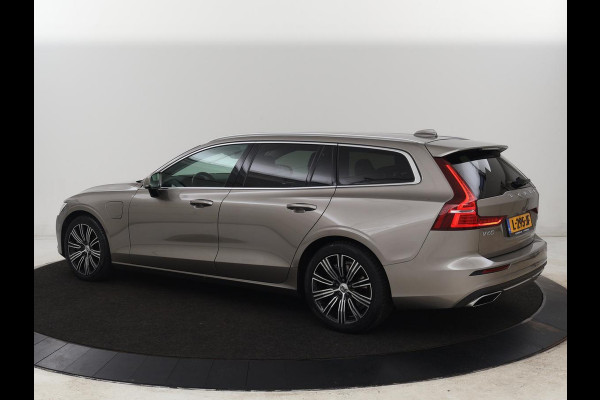Volvo V60 2.0 T6 AWD Recharge Business Pro | Leder | Trekhaak | Stoel & stuurverwarming | Adaptive cruise | Camera | Carplay | Navigatie | Full LED | Parkeerhulp | PHEV | Plug In