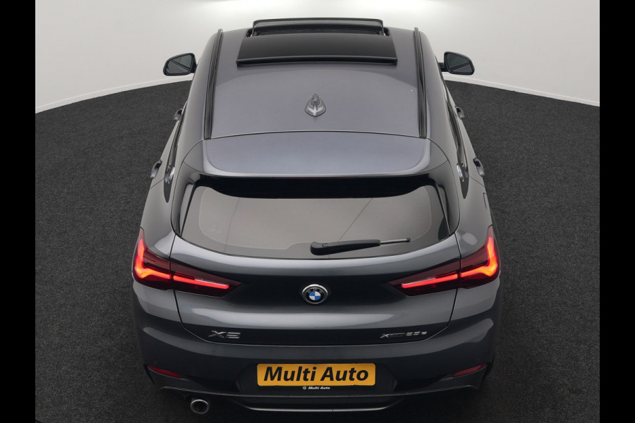 BMW X2 xDrive25e M Sport Plug In Hybrid 220pk Dealer O.H. PHEV | Panodak | Adaptive Cruise | Head Up | Camera | Harman & Kardon | Lederen Sportstoelen Memory & Verwarmd | Sfeerverlichting | Apple Carplay | Keyless | Navigatie | DAB | 19"L.M |