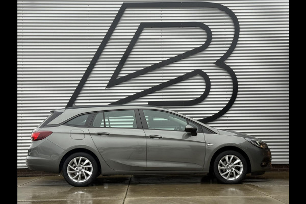 Opel Astra Sports Tourer 1.2 Business Edition 2e Eigenaar,Apple Carplay,Airco,Camera,Cruise,PDC,Trekhaak,N.A.P,APK tot 07-2026