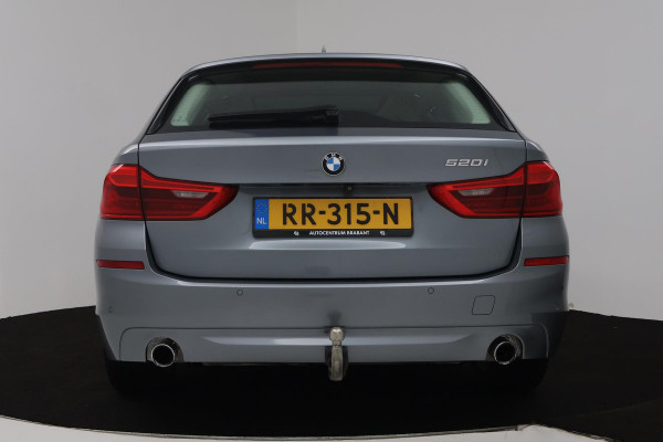 BMW 5 Serie Touring 520i High Executive (PANORAMADAK, STOELVERWARMING, TREKHAAK, ELEKTR STOELEN, HEAD-UP, ACHTERUITRIJCAMERA)