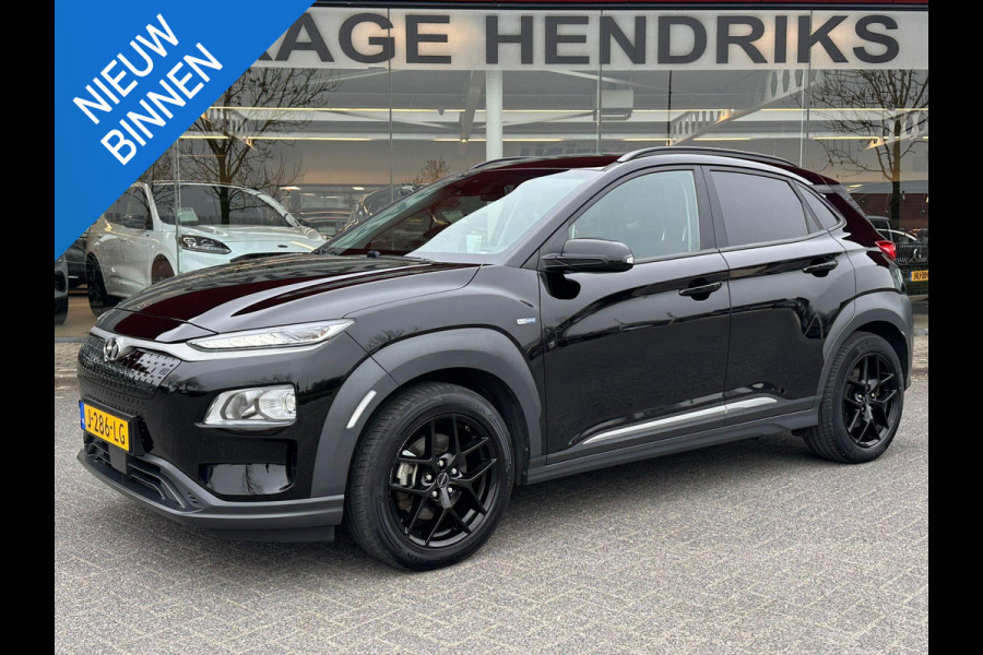 Hyundai Kona EV Fashion 64 kWh | SOH: 96,2% | 3 Fase | warmtepomp | Black Edition LM |  HUD | Blindspot | Climate | Navi |