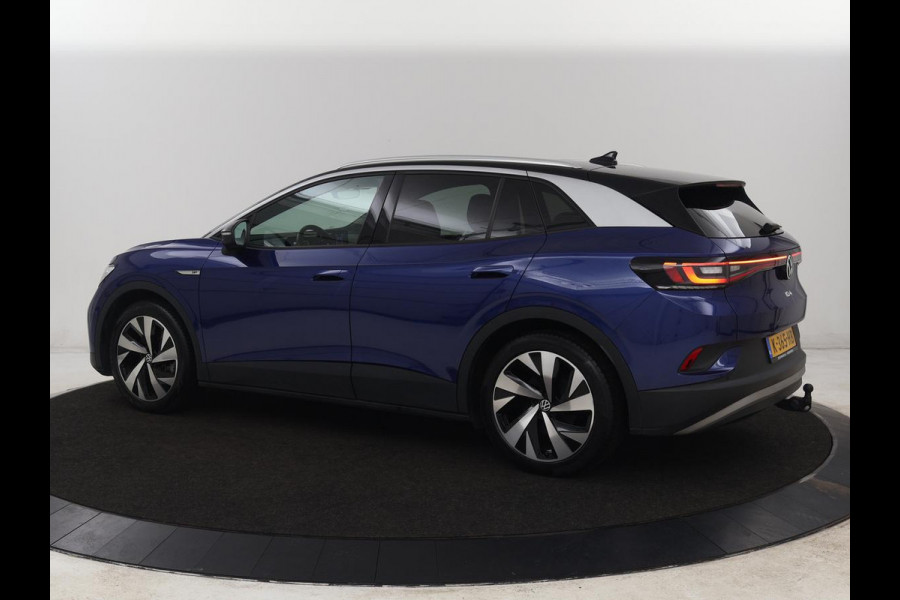 Volkswagen ID.4 First 77 kWh | Trekhaak | Stoel & stuurverwarming | Adaptive cruise | Camera | Carplay | Half leder | Navigatie | 20'' | Full LED | Keyless | Climate control | Sfeerverlichting