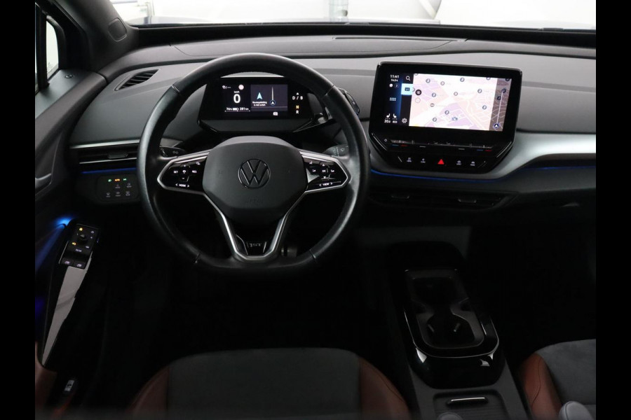 Volkswagen ID.4 First 77 kWh | Trekhaak | Stoel & stuurverwarming | Adaptive cruise | Camera | Carplay | Half leder | Navigatie | 20'' | Full LED | Keyless | Climate control | Sfeerverlichting