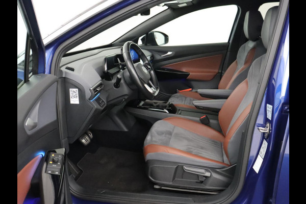 Volkswagen ID.4 First 77 kWh | Trekhaak | Stoel & stuurverwarming | Adaptive cruise | Camera | Carplay | Half leder | Navigatie | 20'' | Full LED | Keyless | Climate control | Sfeerverlichting