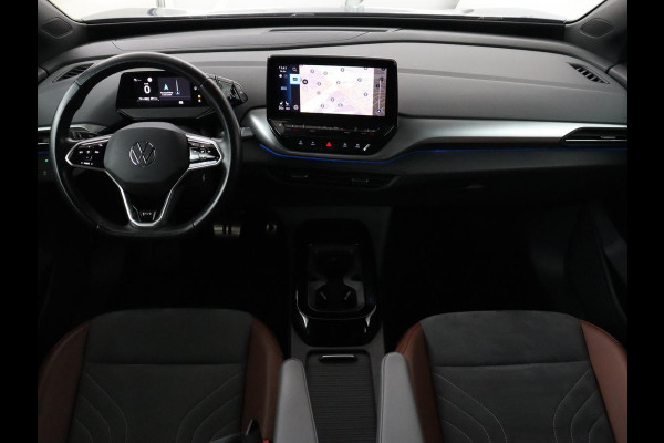 Volkswagen ID.4 First 77 kWh | Trekhaak | Stoel & stuurverwarming | Adaptive cruise | Camera | Carplay | Half leder | Navigatie | 20'' | Full LED | Keyless | Climate control | Sfeerverlichting