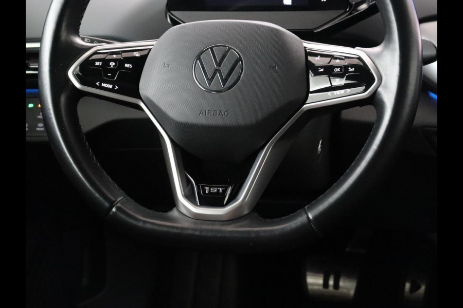 Volkswagen ID.4 First 77 kWh | Trekhaak | Stoel & stuurverwarming | Adaptive cruise | Camera | Carplay | Half leder | Navigatie | 20'' | Full LED | Keyless | Climate control | Sfeerverlichting