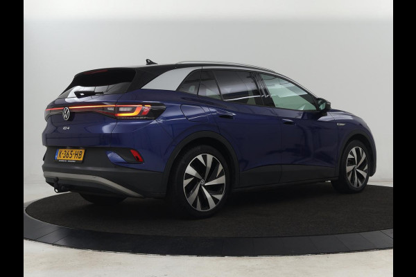 Volkswagen ID.4 First 77 kWh | Trekhaak | Stoel & stuurverwarming | Adaptive cruise | Camera | Carplay | Half leder | Navigatie | 20'' | Full LED | Keyless | Climate control | Sfeerverlichting