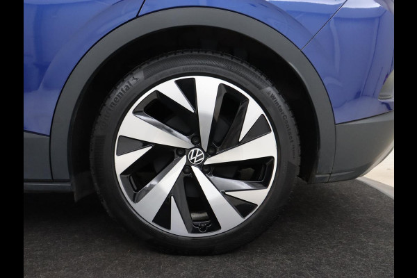 Volkswagen ID.4 First 77 kWh | Trekhaak | Stoel & stuurverwarming | Adaptive cruise | Camera | Carplay | Half leder | Navigatie | 20'' | Full LED | Keyless | Climate control | Sfeerverlichting