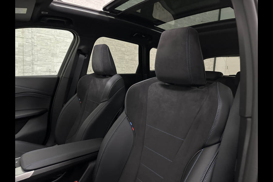 BMW X1 18i M-Sport Performance-Pack | Panorama | Sportstoelen | Carbon | Keyless-Entry | Sfeerverlichting | Achteruitrij-Camera | Carplay | Full-LED | Black-Optic | Getint Glas | Stoelverwarming | Draadloos Laden |
