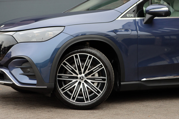 Mercedes-Benz EQE SUV 350+ AMG Line 91 kWh | Hyperscreen | Achterasbesturing | Distronic+ | Surround Camera | Verwarmd Stuurwiel | Digital Light | Keyless Go | Parfumering | 22kW | Memory |