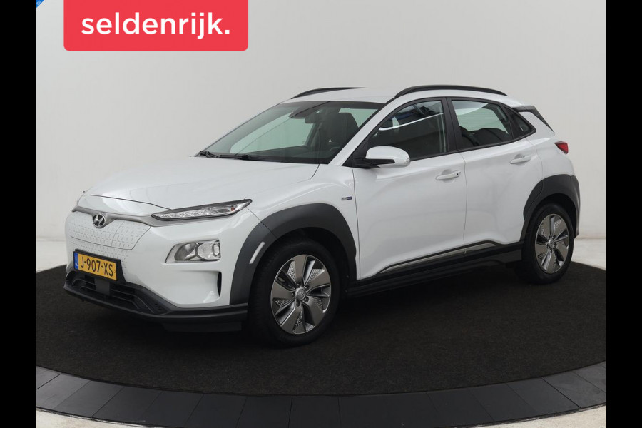 Hyundai Kona EV Comfort 64 kWh | 3-Fase | SOH 98% | Trekhaak | Adaptive cruise | Warmtepomp | Camera | Carplay | Keyless | Navigatie | Climate control