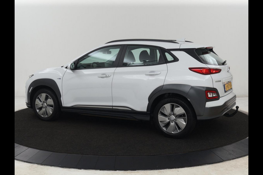 Hyundai Kona EV Comfort 64 kWh | 3-Fase | SOH 98% | Trekhaak | Adaptive cruise | Warmtepomp | Camera | Carplay | Keyless | Navigatie | Climate control