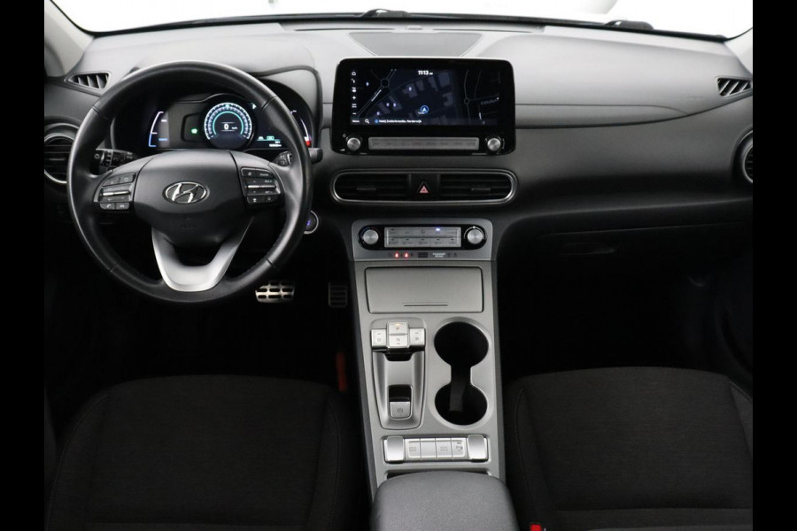 Hyundai Kona EV Comfort 64 kWh | 3-Fase | SOH 98% | Trekhaak | Adaptive cruise | Warmtepomp | Camera | Carplay | Keyless | Navigatie | Climate control